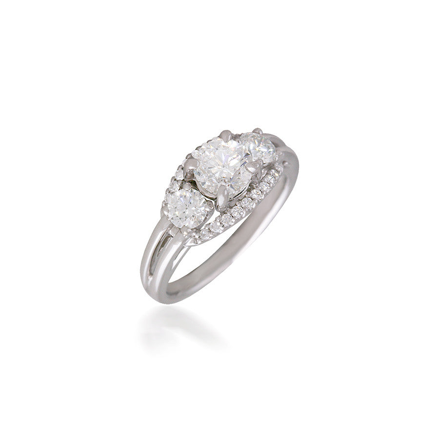 Three Stone Engagement Ring with Adorning Halo