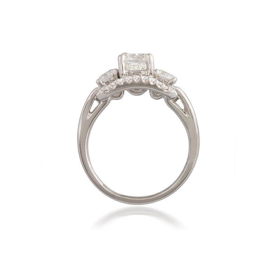 Three Stone Engagement Ring with Adorning Halo