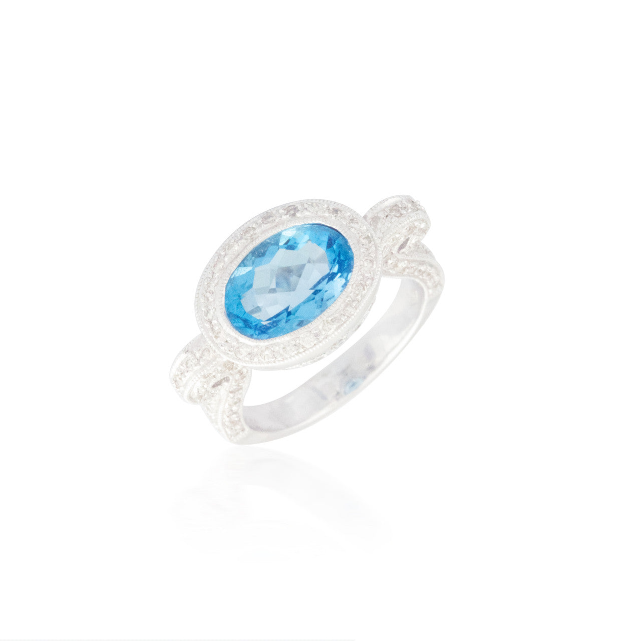 Blue Topaz and Diamond Halo Ring